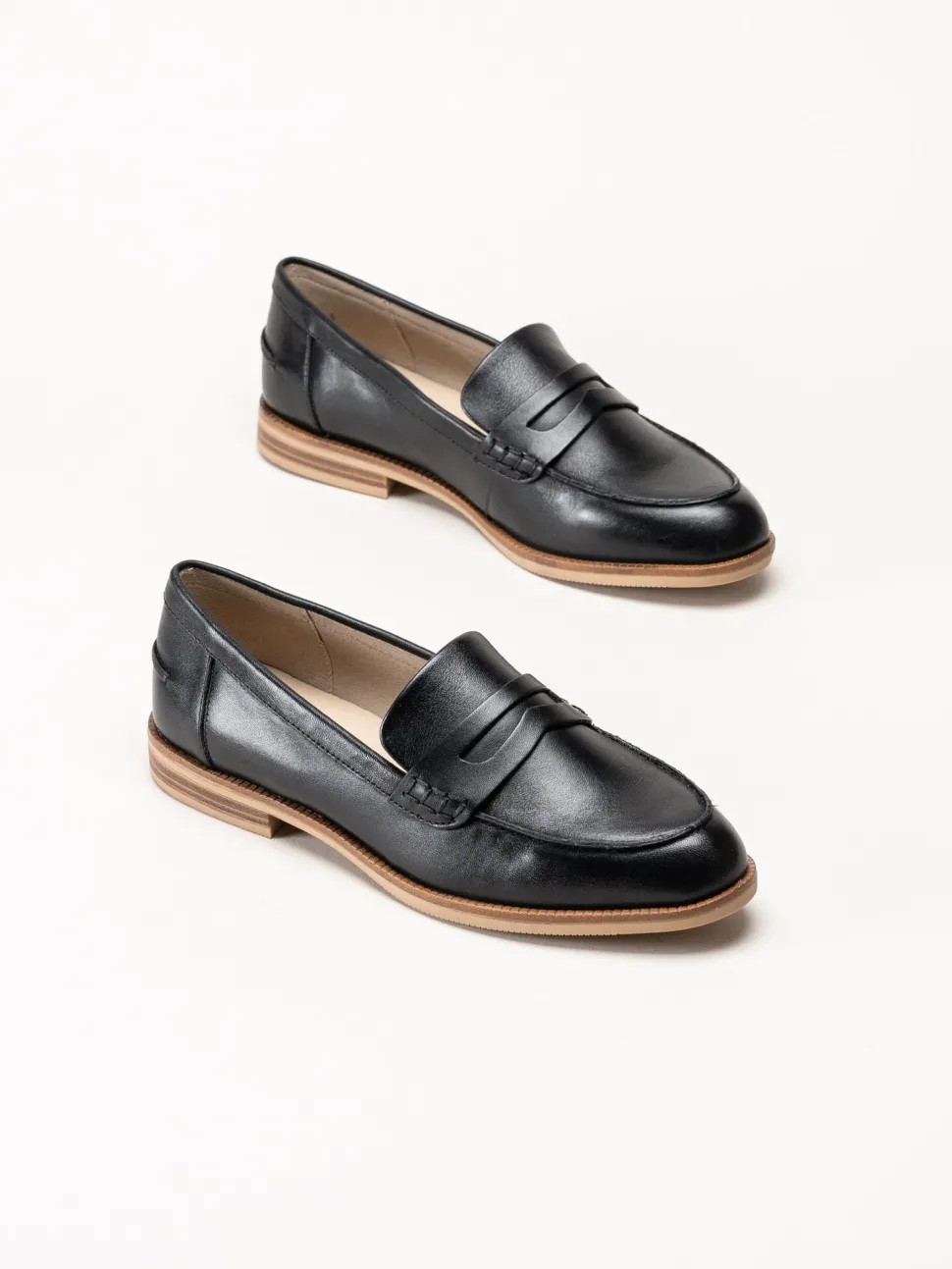 Caprice - Svarta pennyloafers i skinn