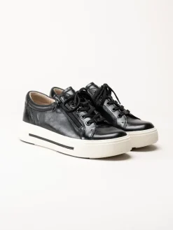 Caprice - Svarta platåsneakers i skinn