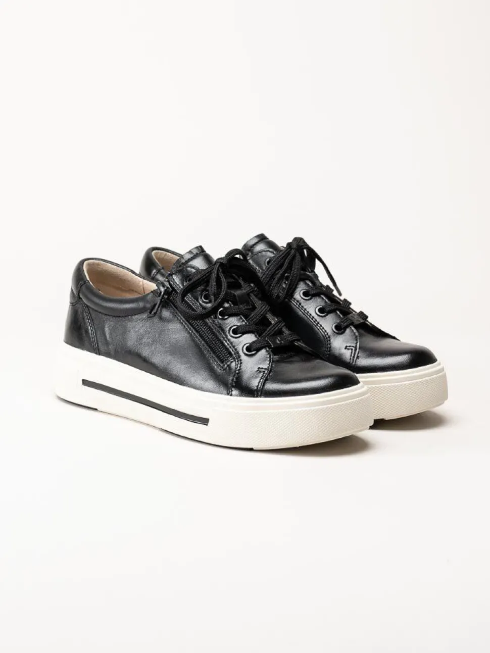 Caprice - Svarta platåsneakers i skinn