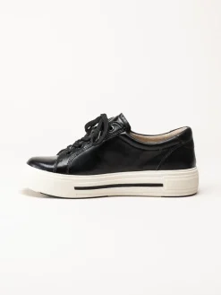 Caprice - Svarta platåsneakers i skinn