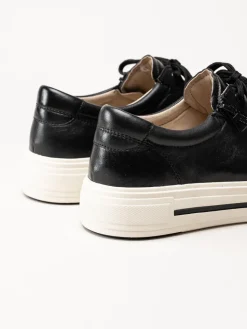 Caprice - Svarta platåsneakers i skinn
