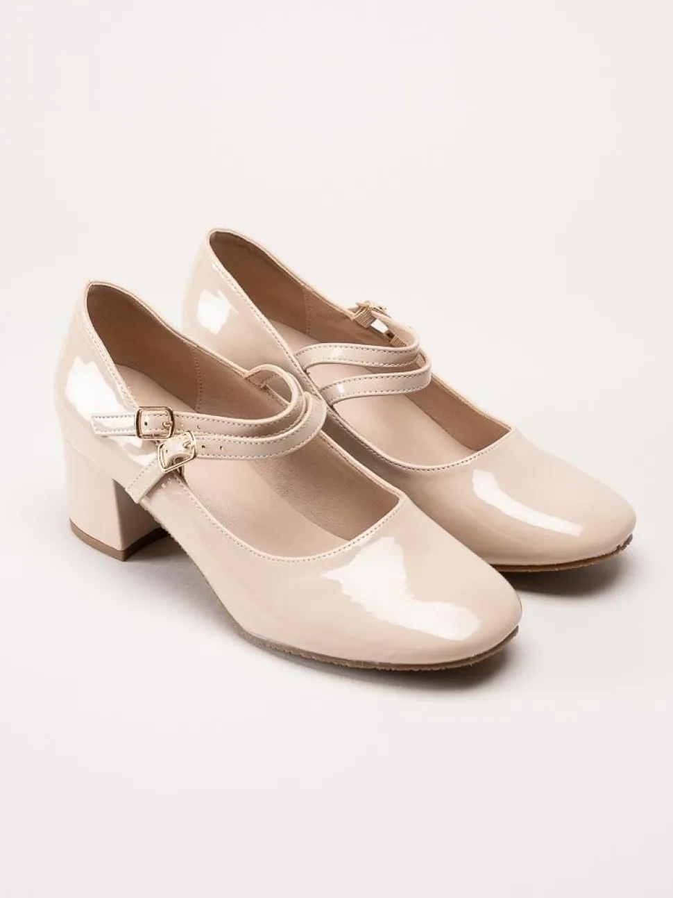 Duffy - Beige lackpumps med remmar