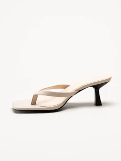Duffy - Beige mules med tårem