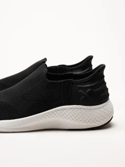 Exani - Ease M - Svarta slip on skor i textil