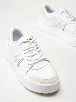 Lacoste - L002 EVO - Vita sneakers i skinn och mocka