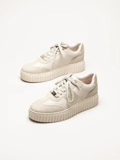 Marco Tozzi - Beige sneakers i skinnimitation