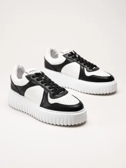 Philip Hog - Nina - Svart-vita platåsneakers i skinn