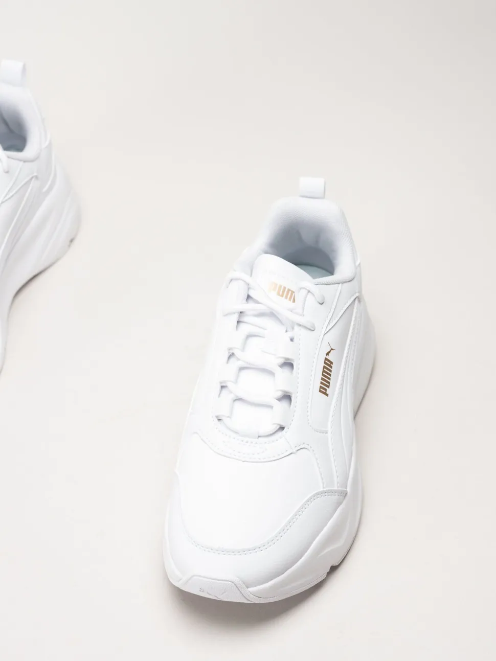 Puma - Cassia 2.0 - Vita sneakers i skinnimitation