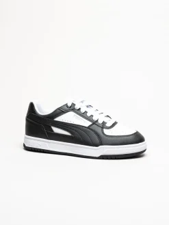 Puma - Caven III - Svartvita sneakers i skinnimitation