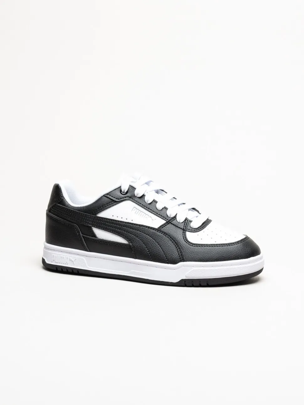 Puma - Caven III - Svartvita sneakers i skinnimitation
