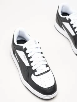 Puma - Caven III - Svartvita sneakers i skinnimitation