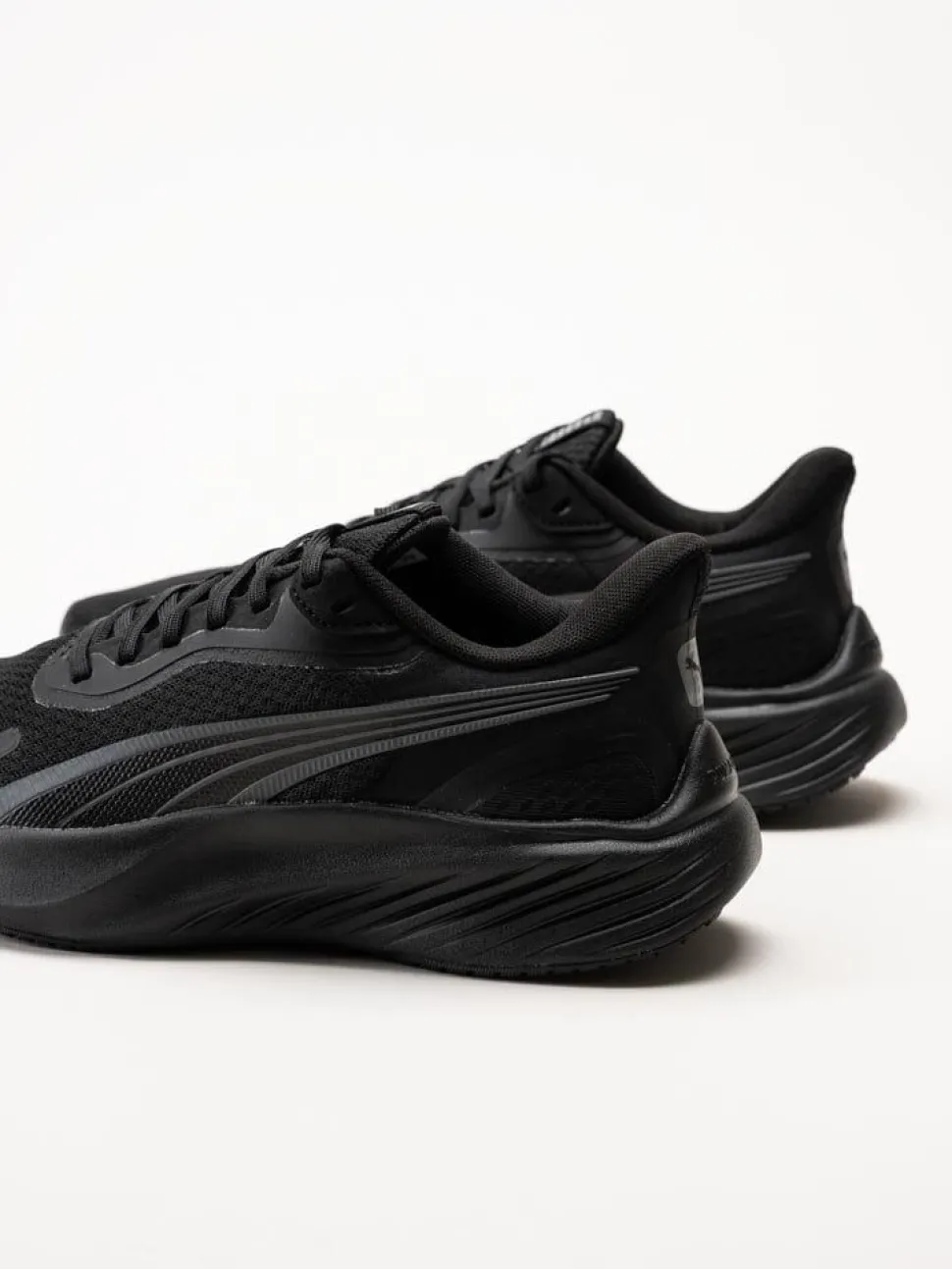 Puma - Pounce Lite - Svarta löparskor i textil