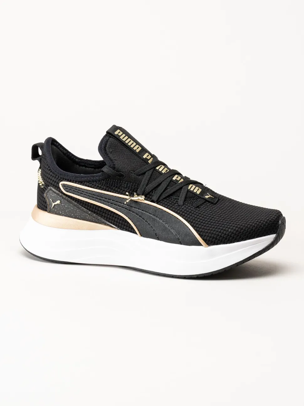 Puma - Softride Sabrina - Svarta sneakers