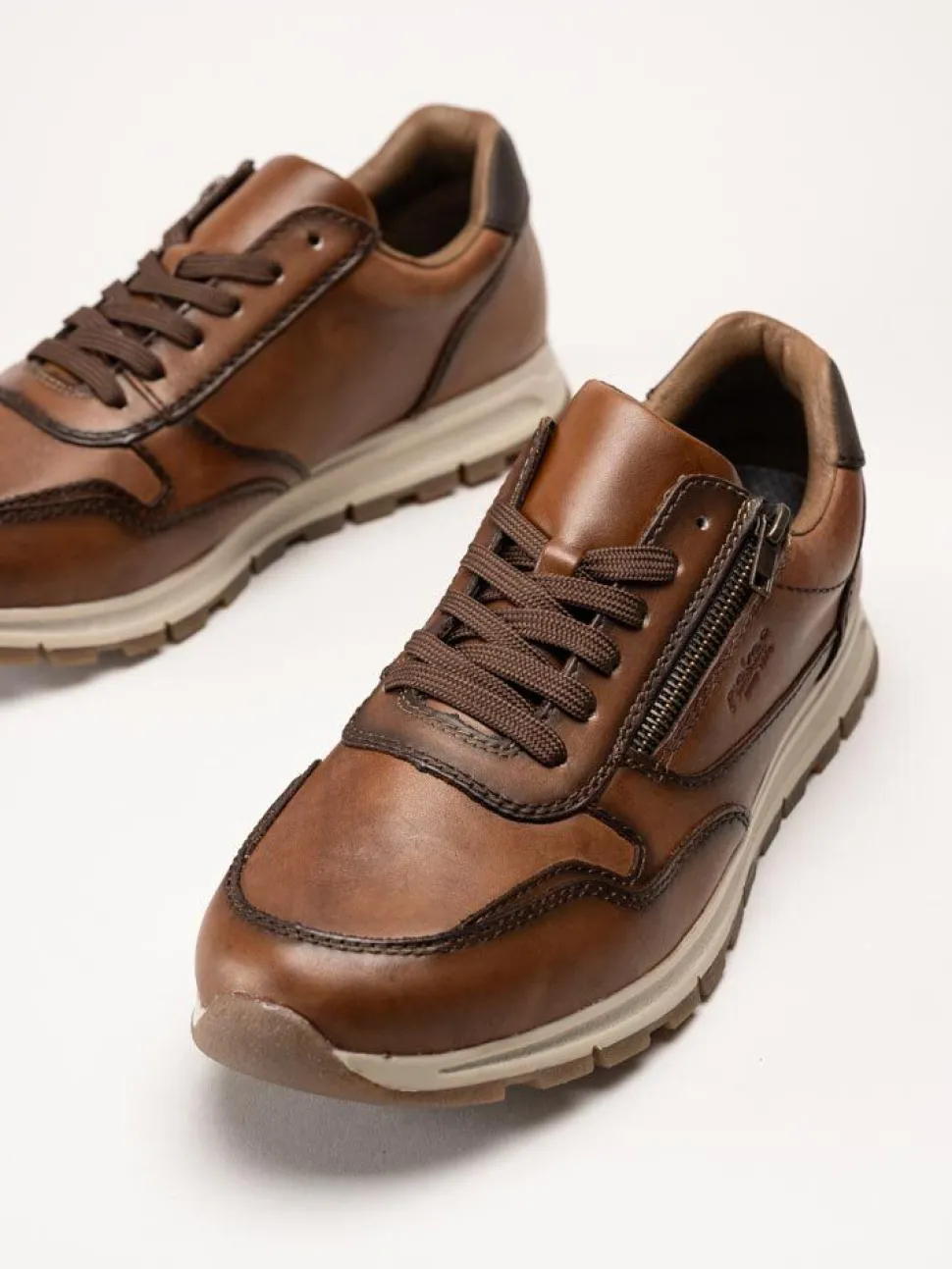 Rieker - Bruna sneakers i skinn