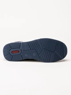 Rieker - Mörkblå slip on skor i stickad mesh