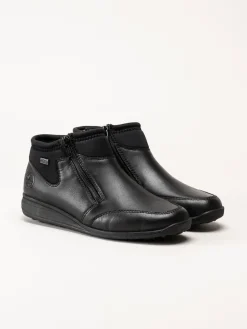 Rieker - Svarta boots i skinn och textil