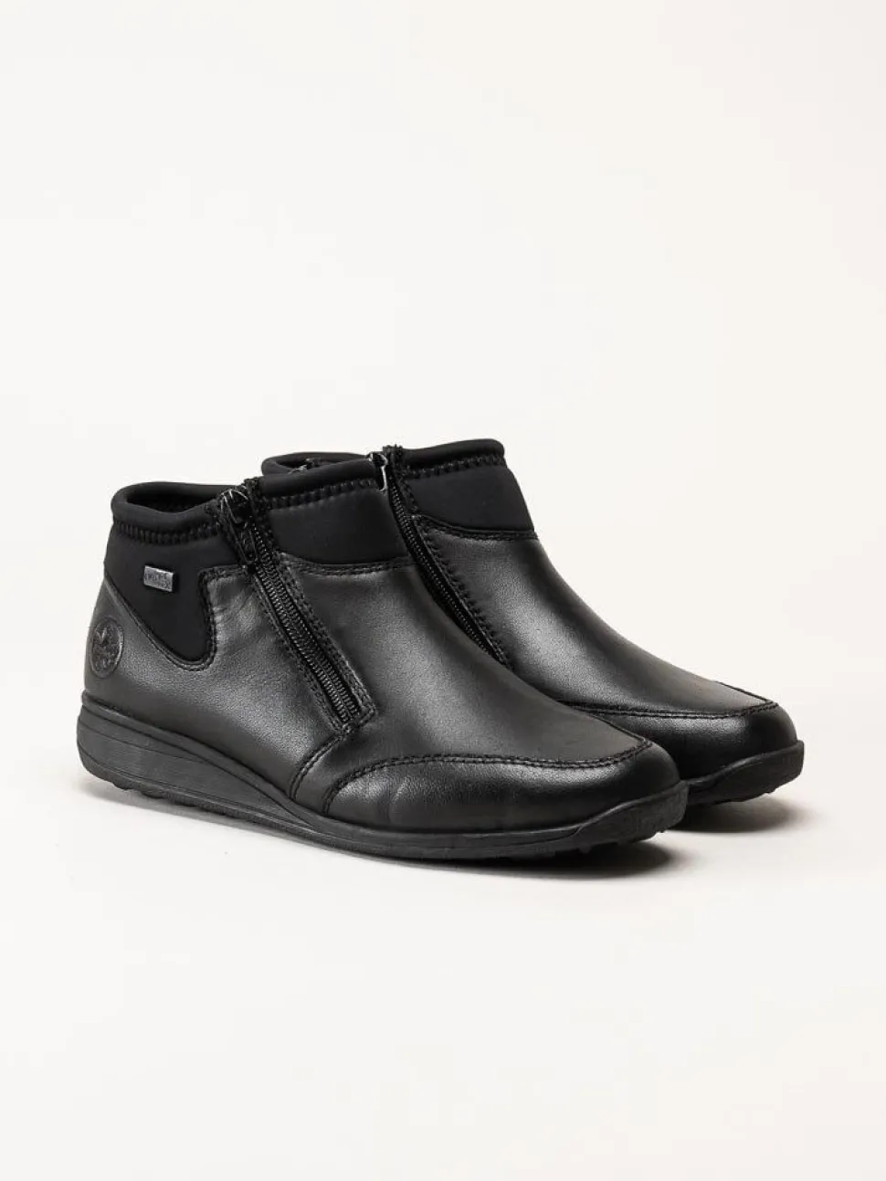 Rieker - Svarta boots i skinn och textil