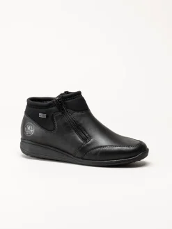 Rieker - Svarta boots i skinn och textil