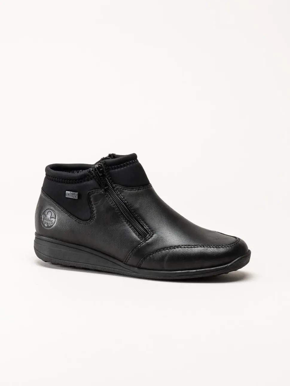 Rieker - Svarta boots i skinn och textil