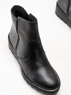 Rieker - Svarta fodrade kilklackade boots