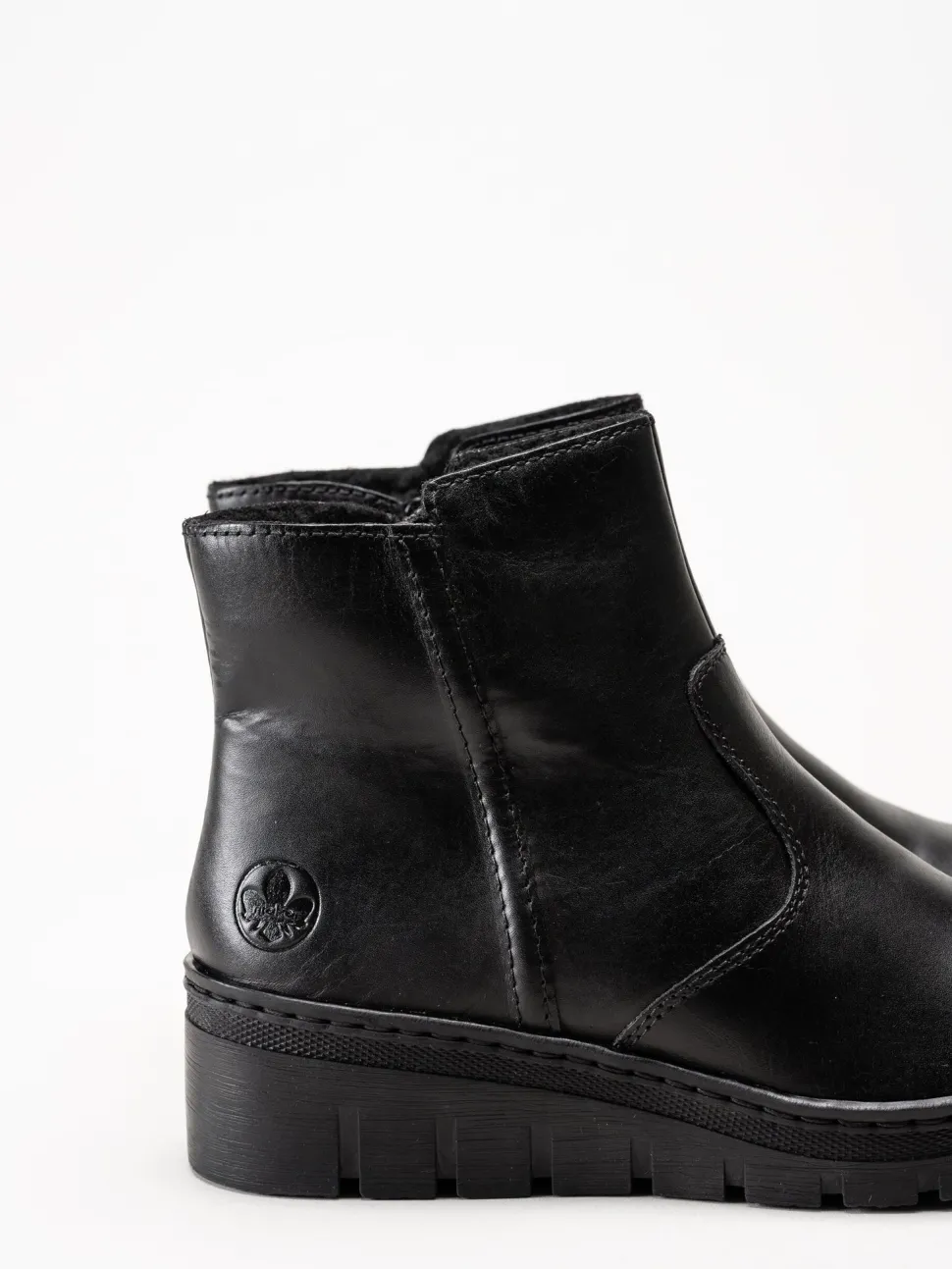 Rieker - Svarta fodrade kilklackade boots