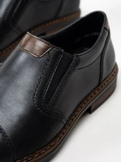 Rieker - Svarta loafers i skinn