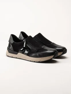 Rieker - Svarta promenadsneakers i nubuck och skinn