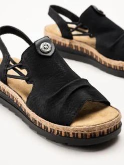 Rieker - Svarta sandaler med kilklack
