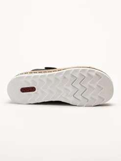 Rieker - Svarta slip in sandaler i skinn
