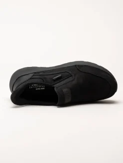 Rieker - Svarta slip on promenadskor i oljad nubuck