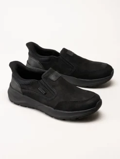 Rieker - Svarta slip on promenadskor i oljad nubuck