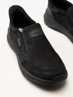 Rieker - Svarta slip on promenadskor i oljad nubuck