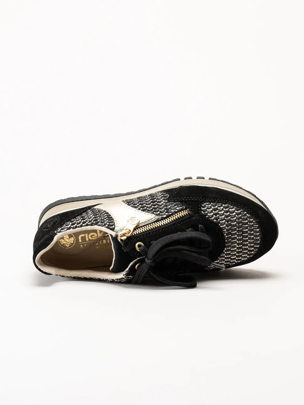 Rieker - Svarta sneakers i mocka och textil