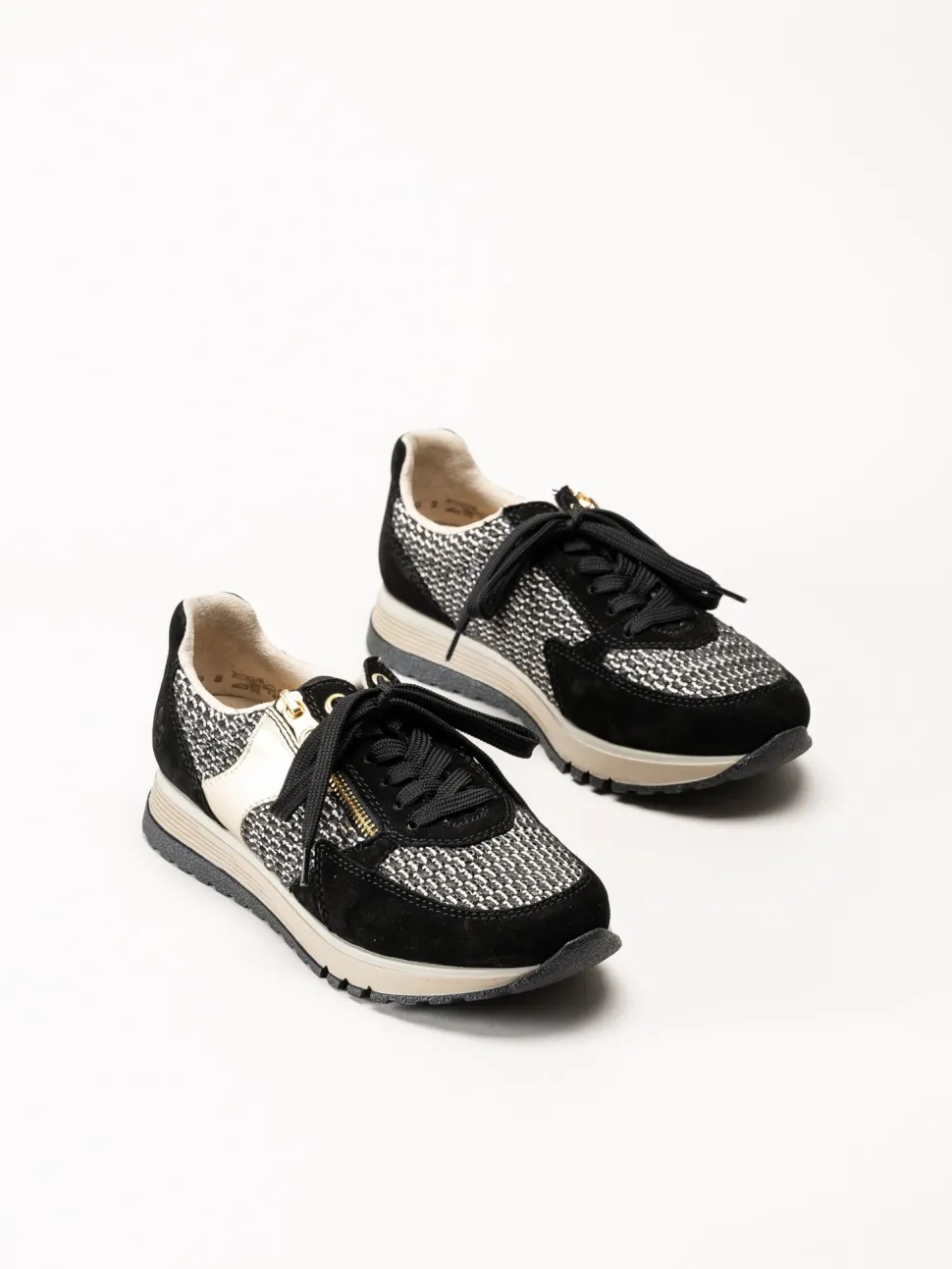 Rieker - Svarta sneakers i mocka och textil
