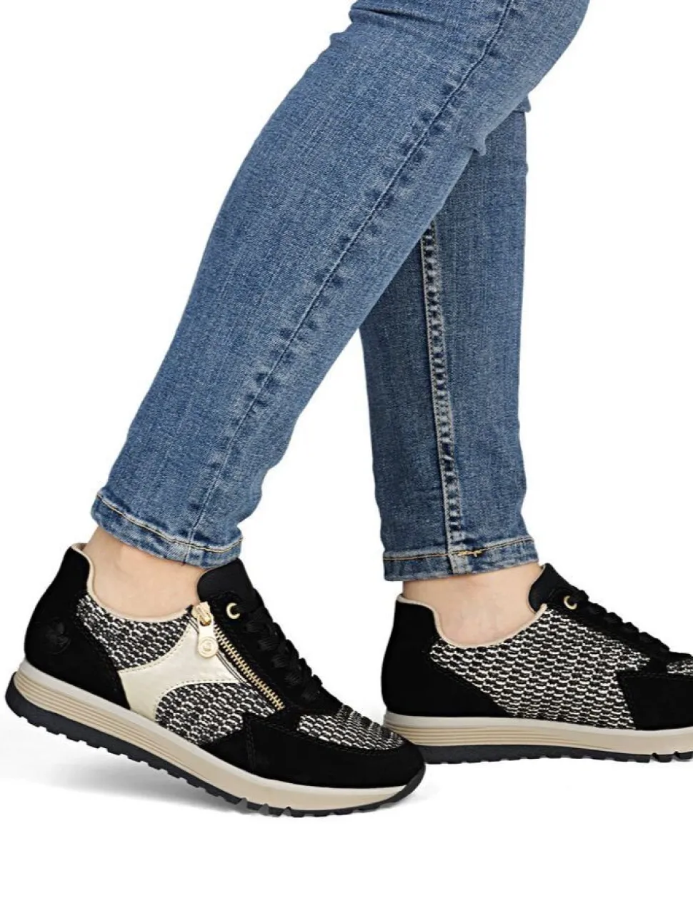 Rieker - Svarta sneakers i mocka och textil