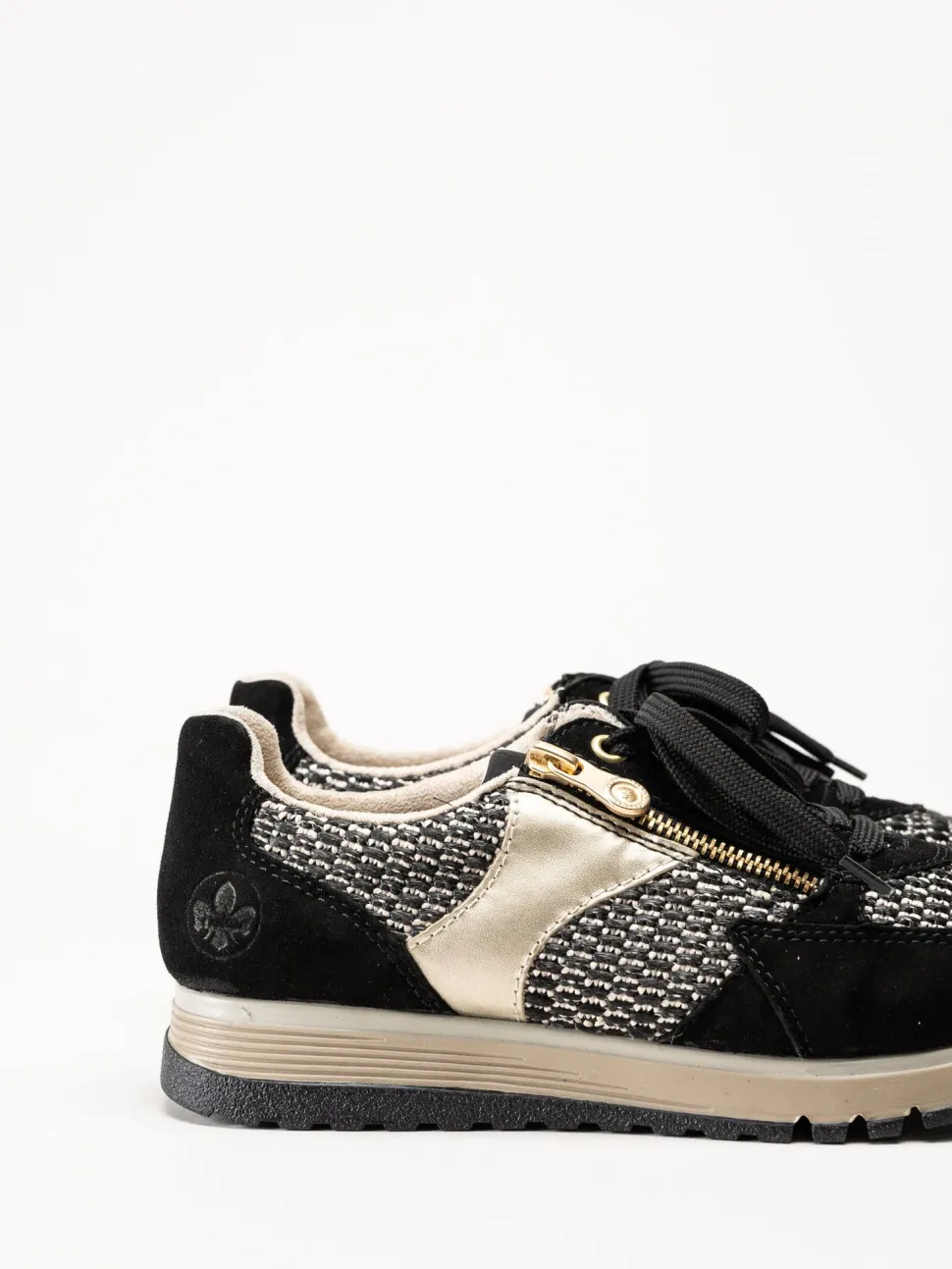 Rieker - Svarta sneakers i mocka och textil