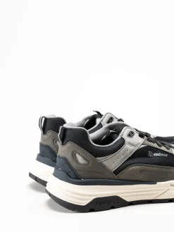 Rieker - Svarta sneakers i textil