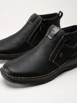 Rieker - Svarta ullfodrade boots i skinn