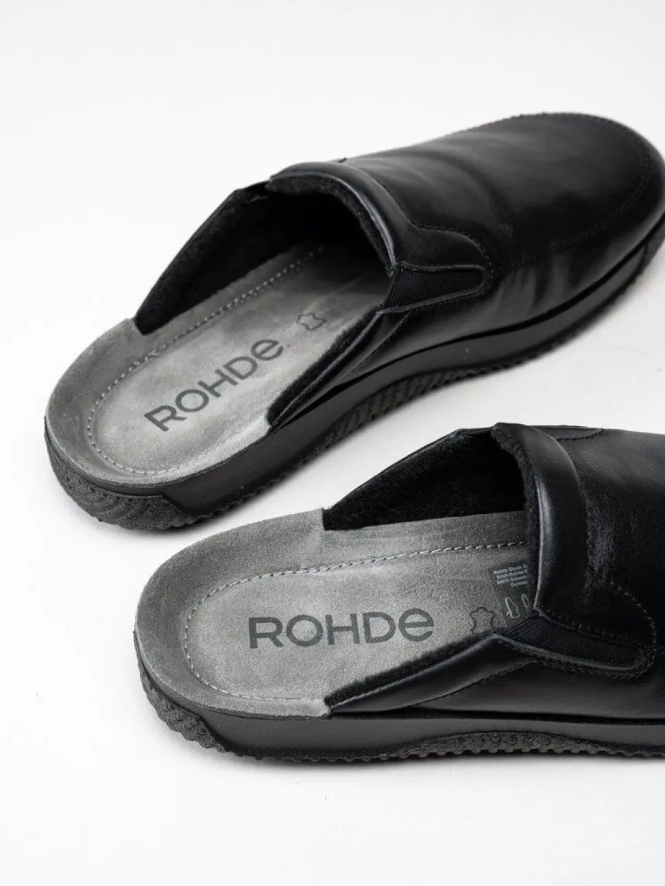 Rohde - Svarta slip in tofflor i skinn