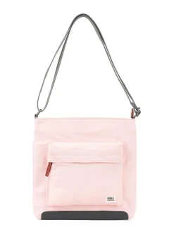 ROKA - Kennington B Recycled Nylon - Rosa axelremsväska i återvunnen nylon