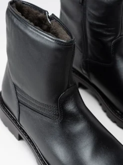 Sata - Svarta fårskinnsfodrade boots i skinn