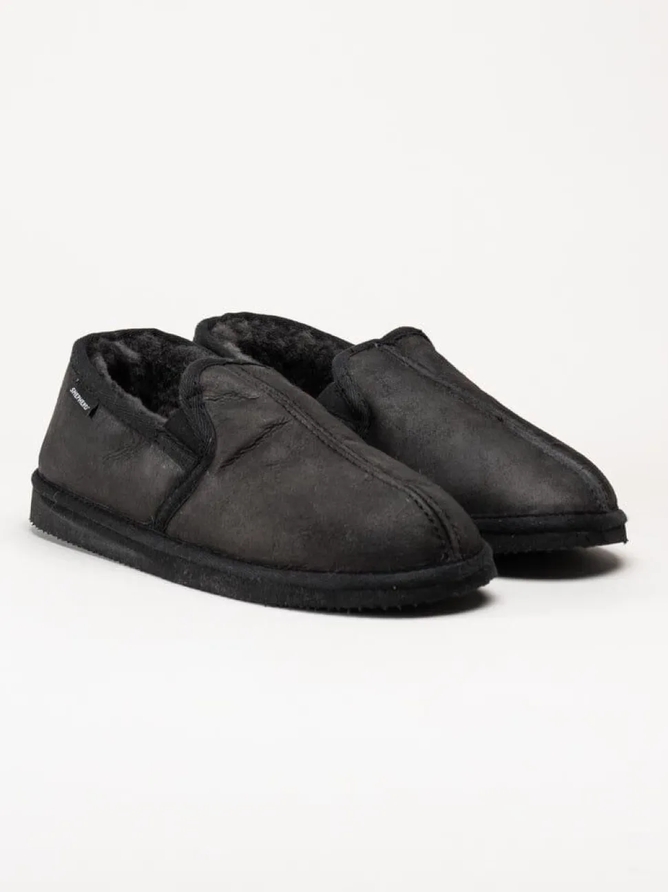 Shepherd - Bosse - Svarta slip on fårskinnstofflor