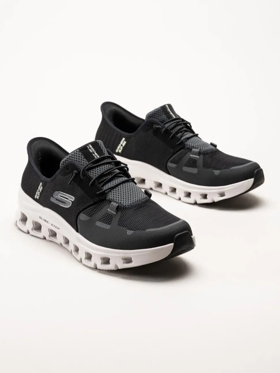 Skechers - Glide Step Pro - Svarta slip-ins sneakers i textil