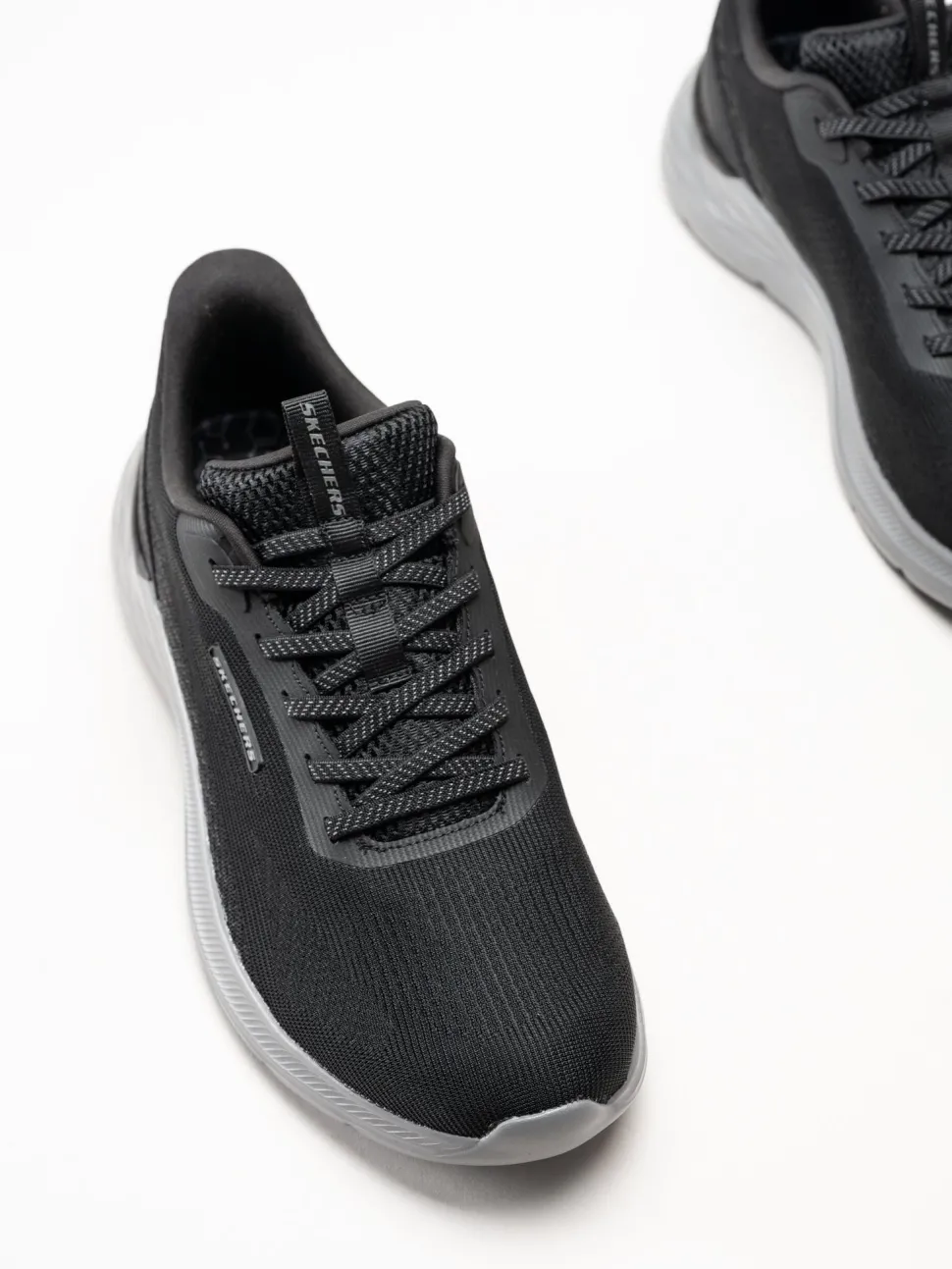Skechers - Slip-Ins Garner - Svarta slip-ins sneakers i mesh