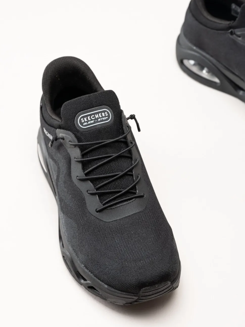 Skechers - Uno Glide Step - Svarta slip-ins sneakers i mesh