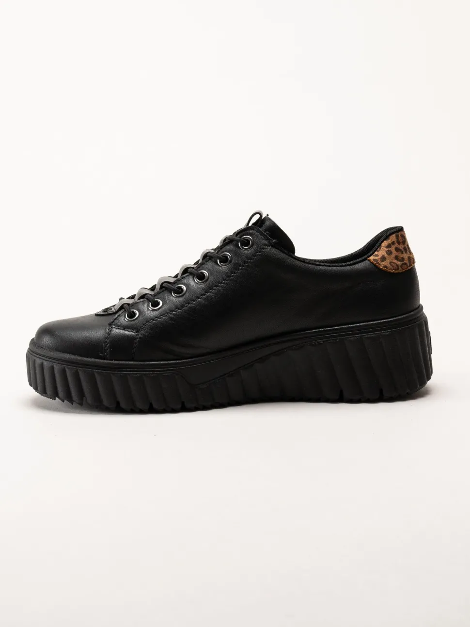 Svarta sneakers i skinn