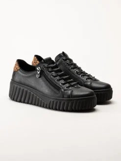 Svarta sneakers i skinn
