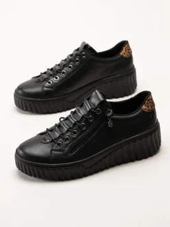 Svarta sneakers i skinn