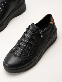 Svarta sneakers i skinn