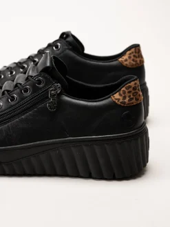 Svarta sneakers i skinn
